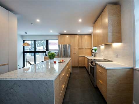 Kitchen with granite countertops and wooden cabinets